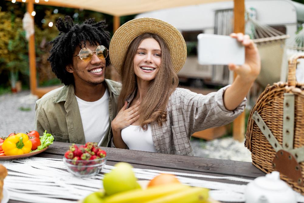 young couple taking photo | second opinion dentist near me